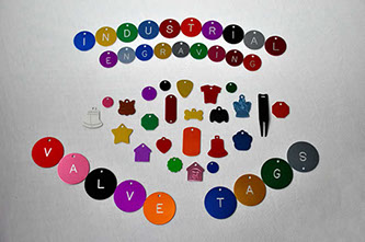 deep engraved text on valve identification tag multiple colors