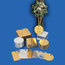 deep engraved text on valve identification tag 