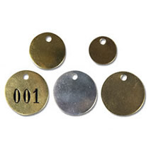 deep engraved text on valve identification tag 